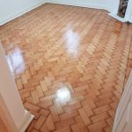 Polished wooden floor restoration London